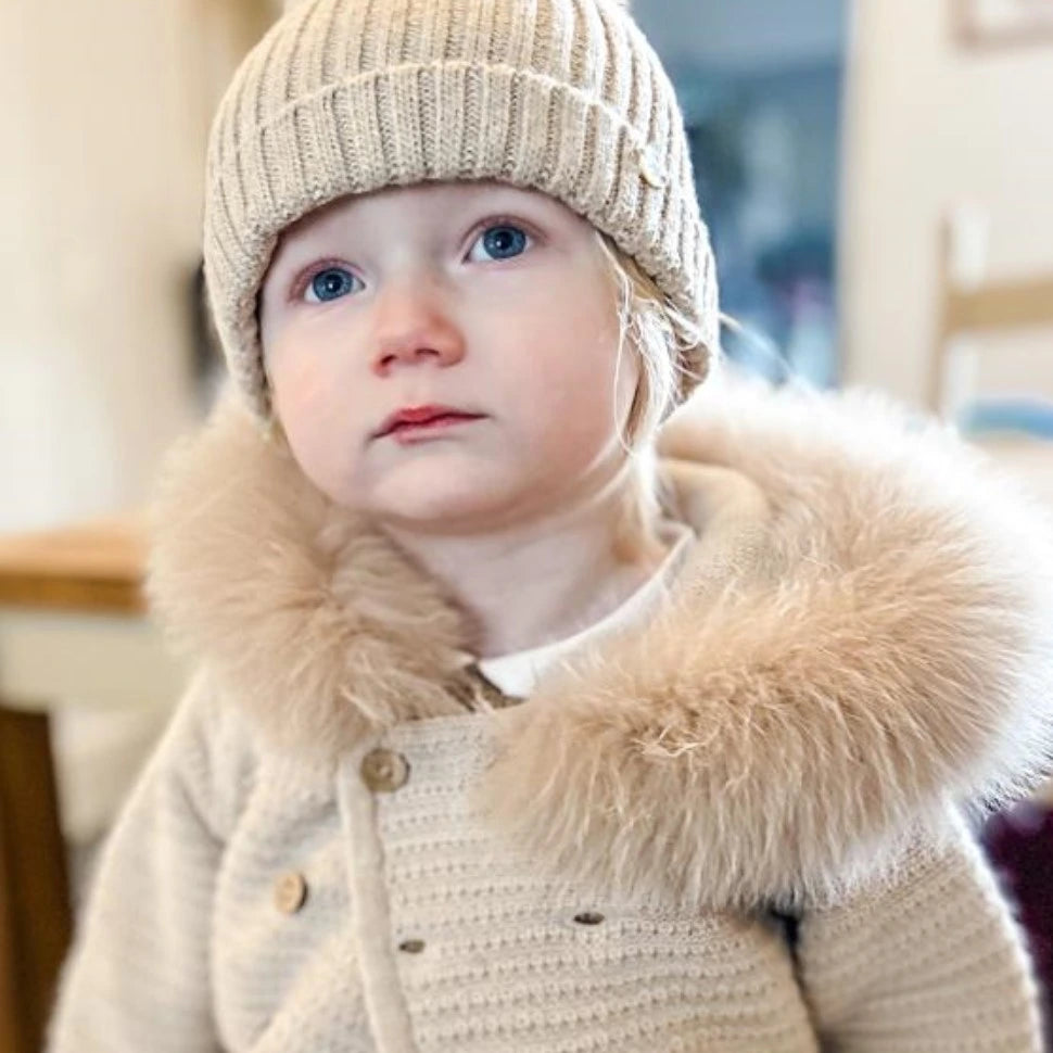 beige single pom hat from martin aranda