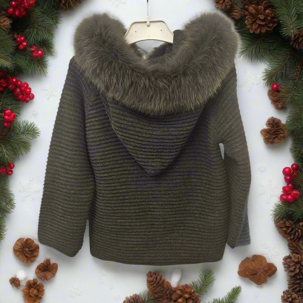 Dark green knitted jacket with fur hood on a white background