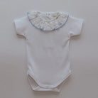 blue floral bodysuit and jam pants by rigola
