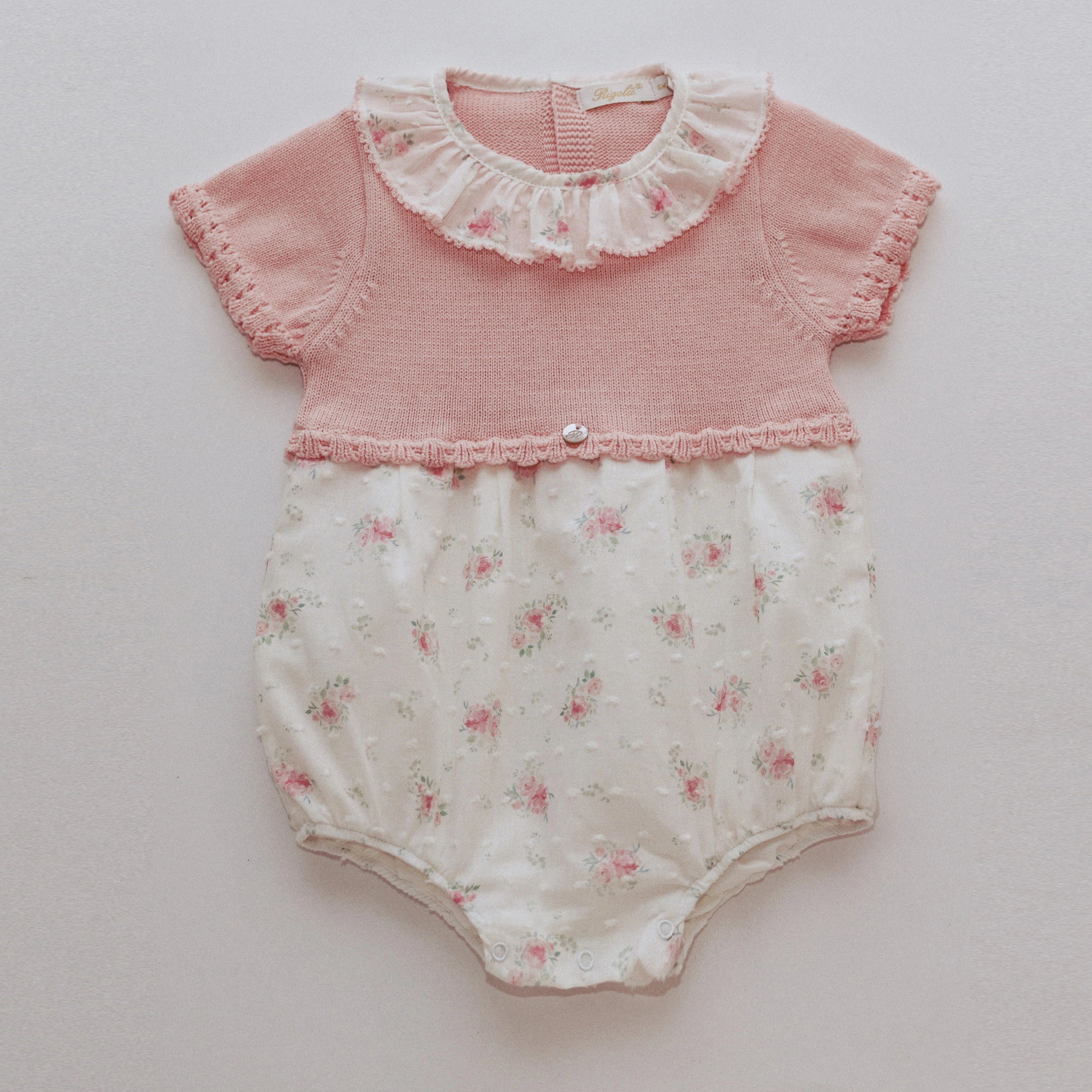 pink half knit baby romper with floral print peplum bottom half