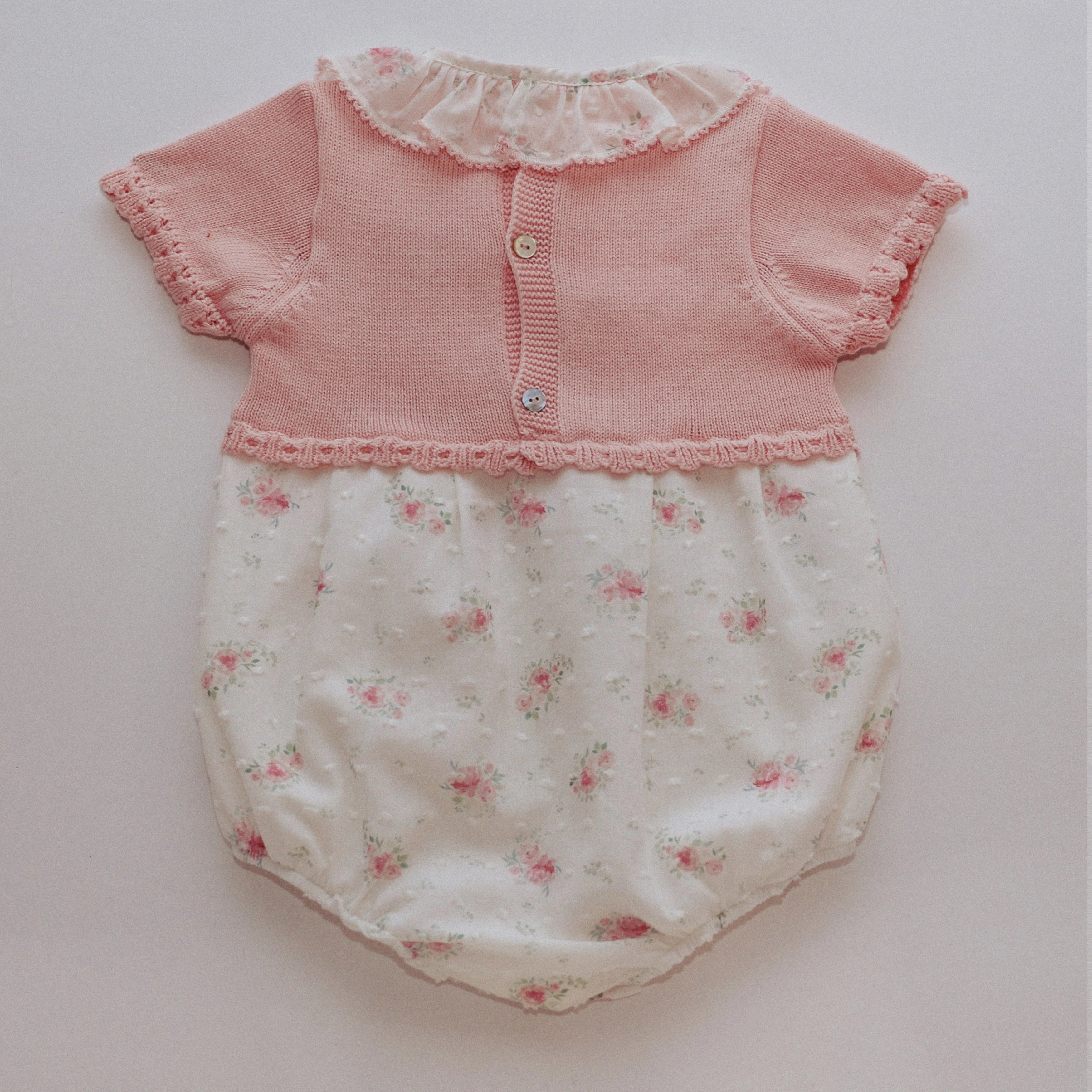 pink half knit baby romper with floral print peplum bottom half