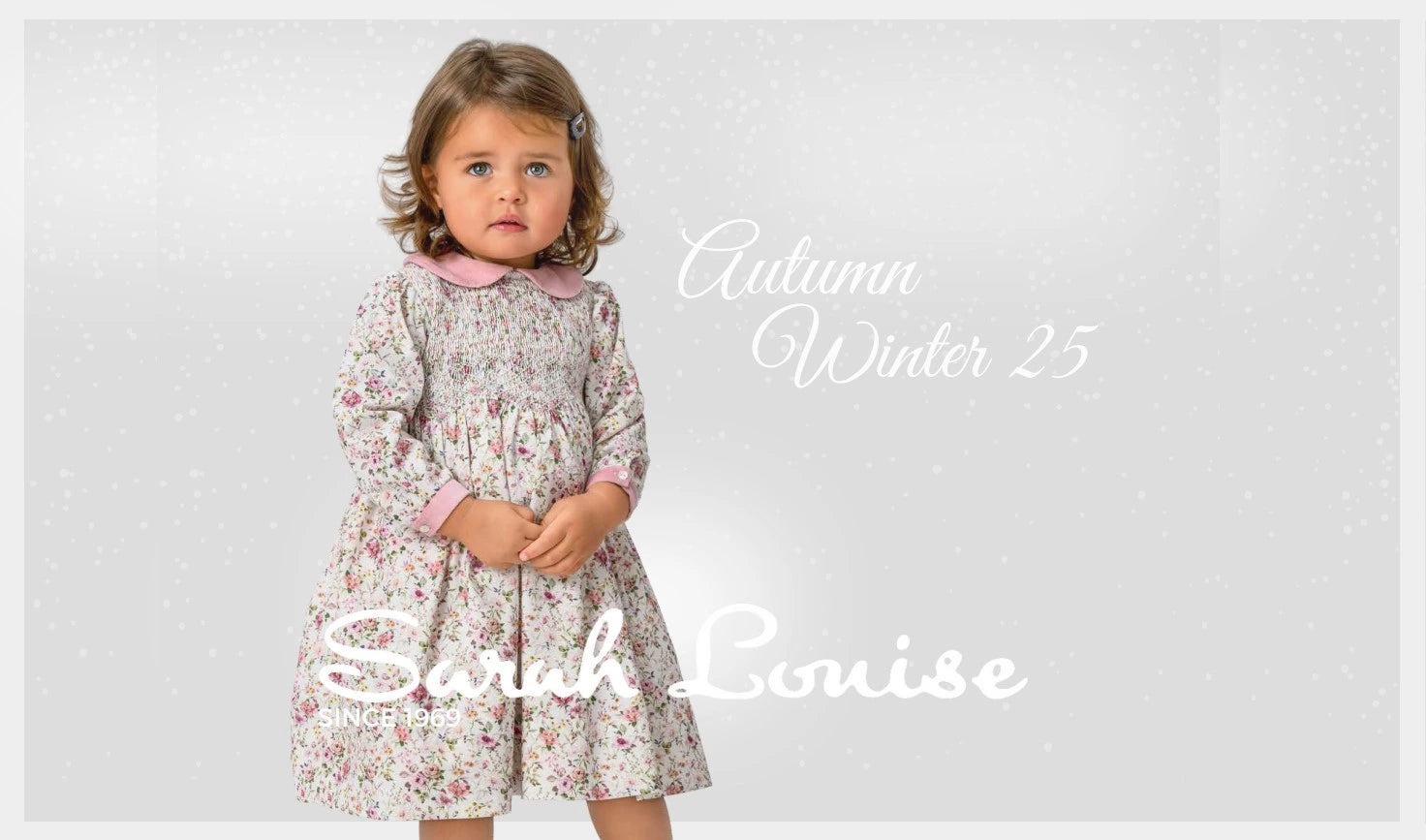 Young girl wearing a floral dress with 'Autumn Winter 25' and 'Sarah Louise' text on a light gray background