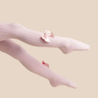 sevva pink ribbed tights with bow