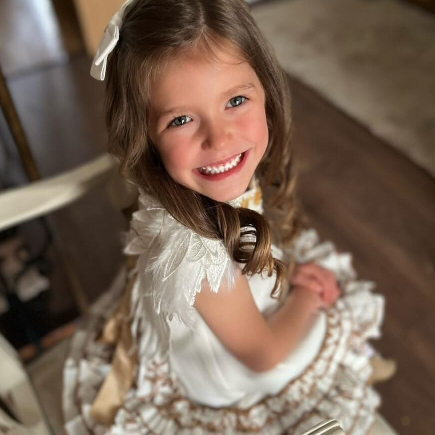 angeline dress by petit maison kids side view