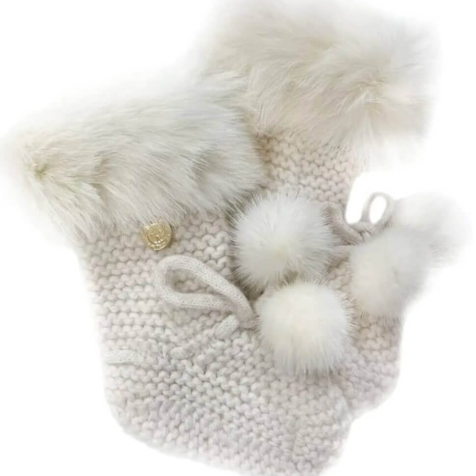 100% Angora hand-knit booties with natural white poms and trim.