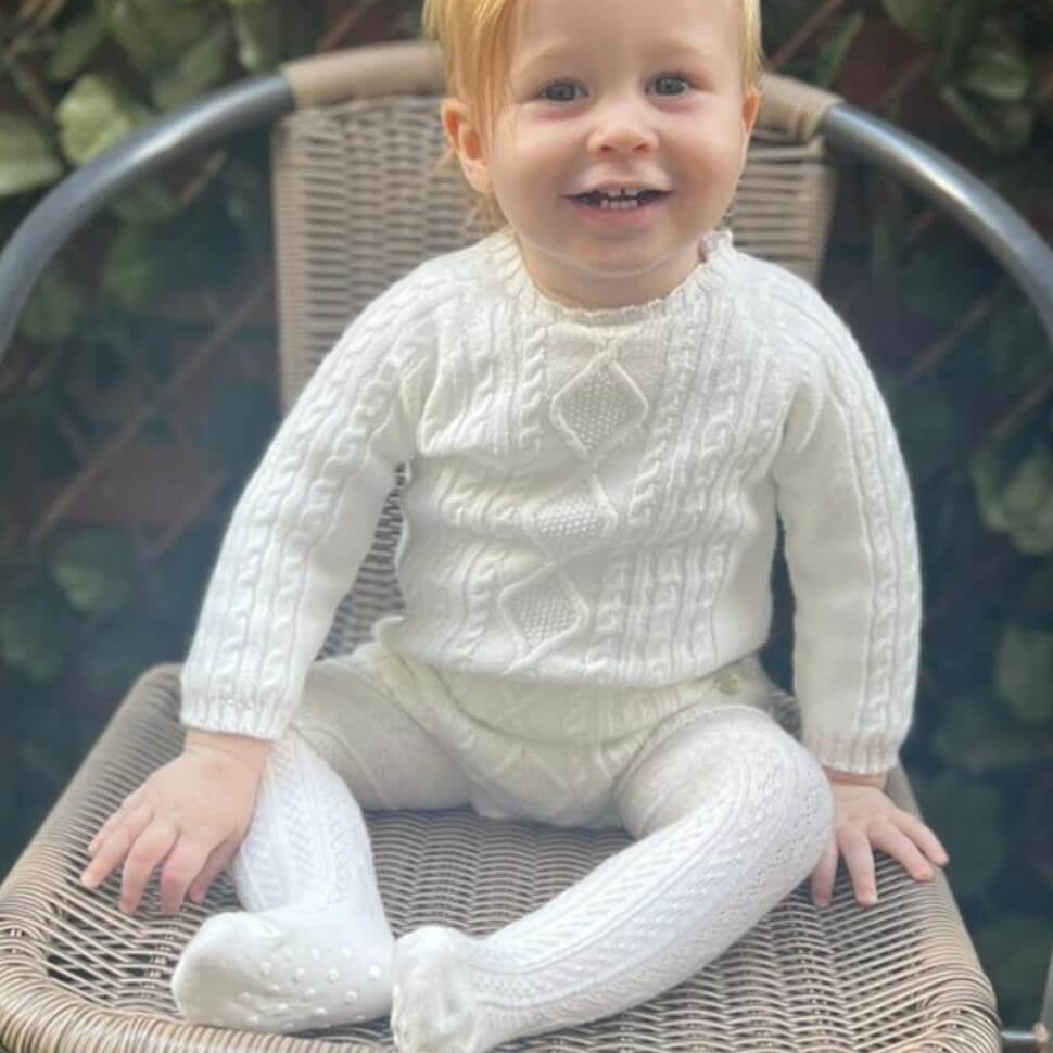 tors childrens wear ivory short knit romper by spanish brand martin aranda