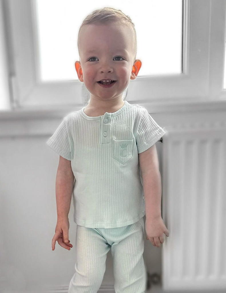 brand rep nolan wearing ss23 caramelo kids mint ribbed set