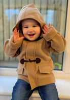 Sardon beige lined duffle coat with hood available at tors childrens wear