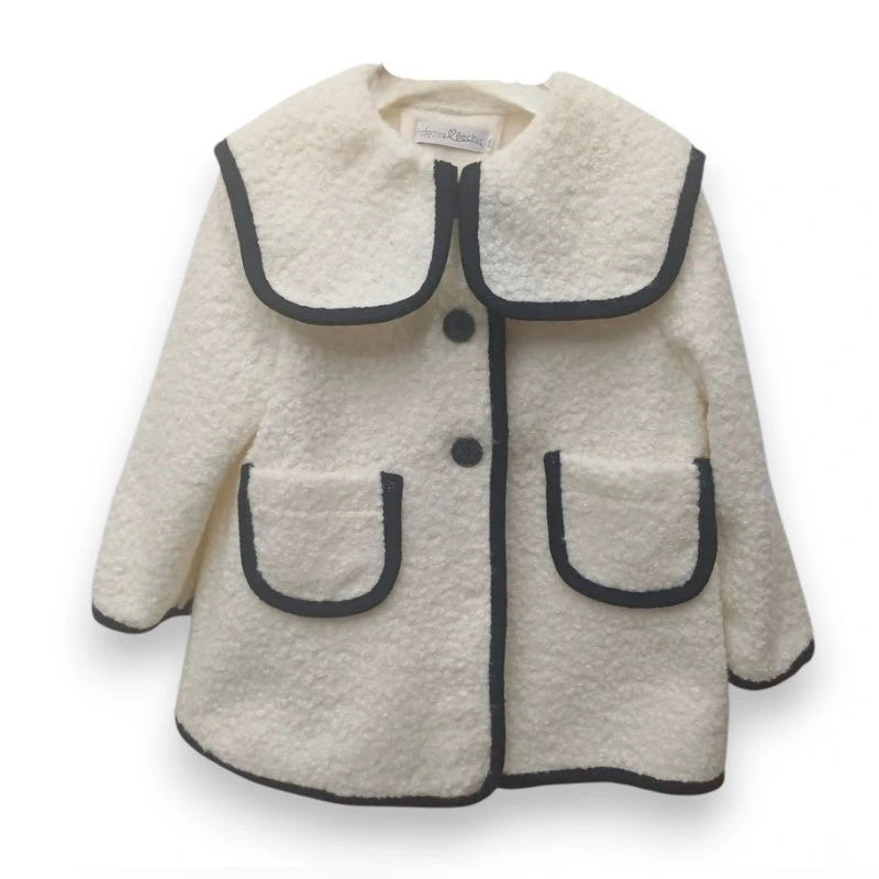 Children's coat with black trim on a white background