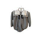 black houndstooth romper with white bib