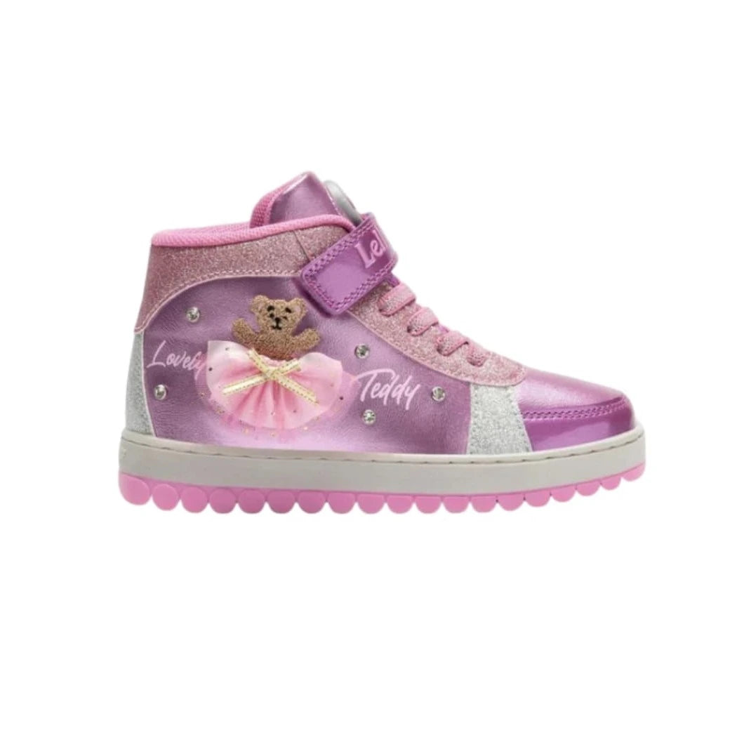 Pink children's shoe with teddy bear design on a white background