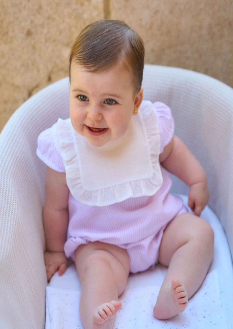 rapife pink baby grow with white bib 