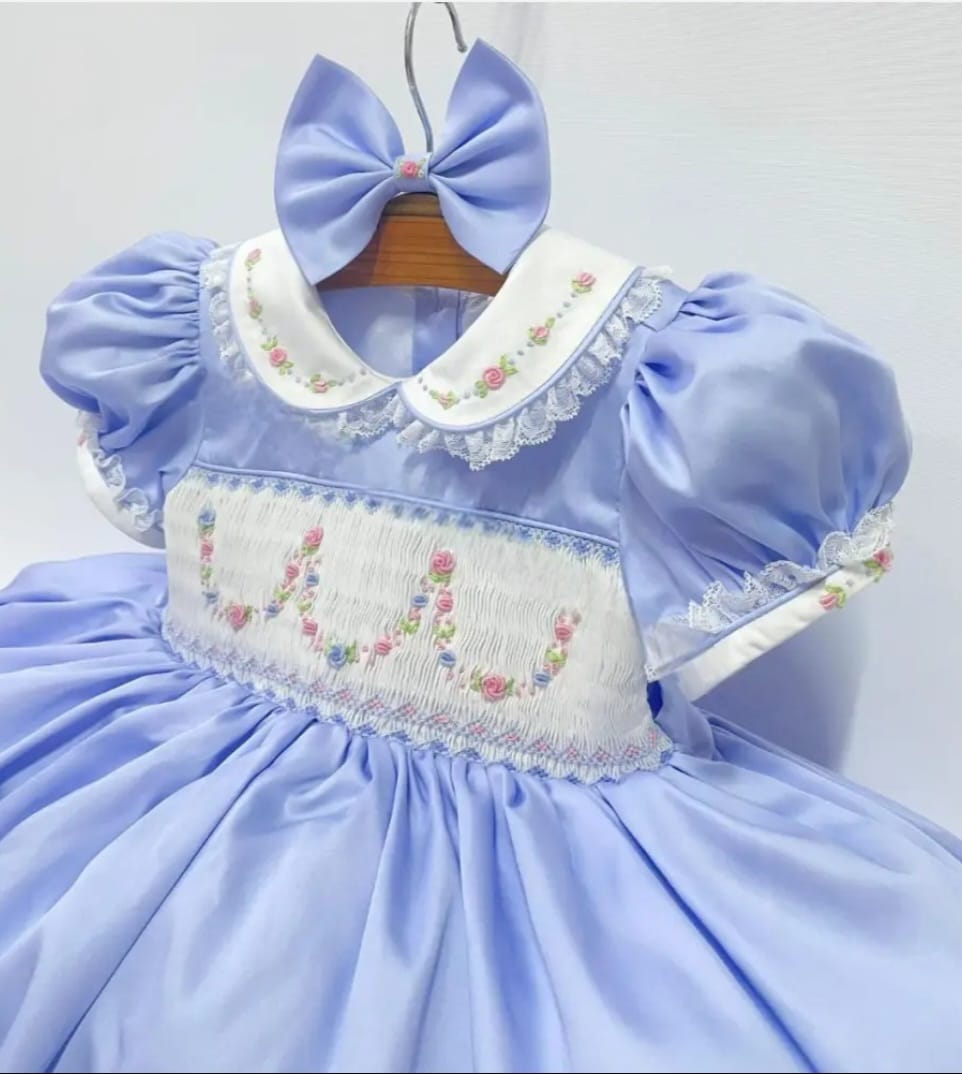 Blue hand Smocked dress and bow for girls