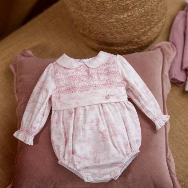 romera baby romper flat lay display by deolinda