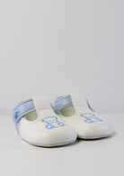 sky and white baypod shoes with teddy motif