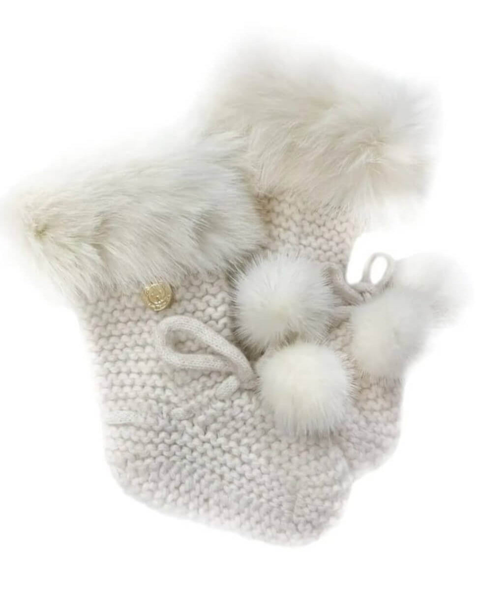 100% Angora hand-knit booties with natural white poms and trim.