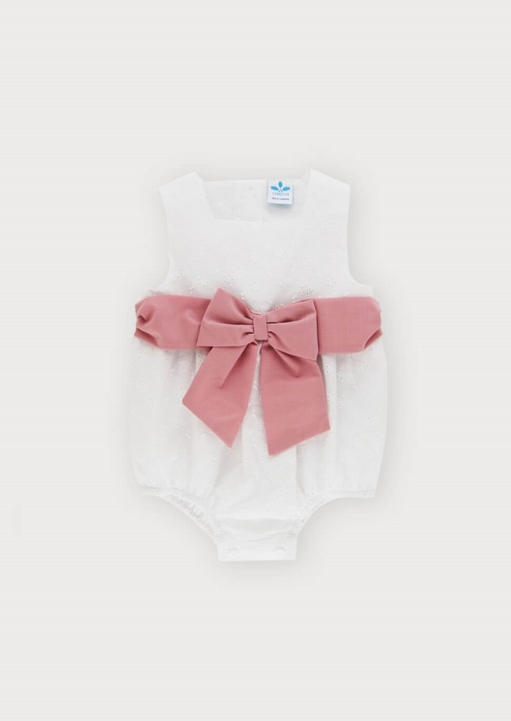 white baby romper with large pink bow by sardon