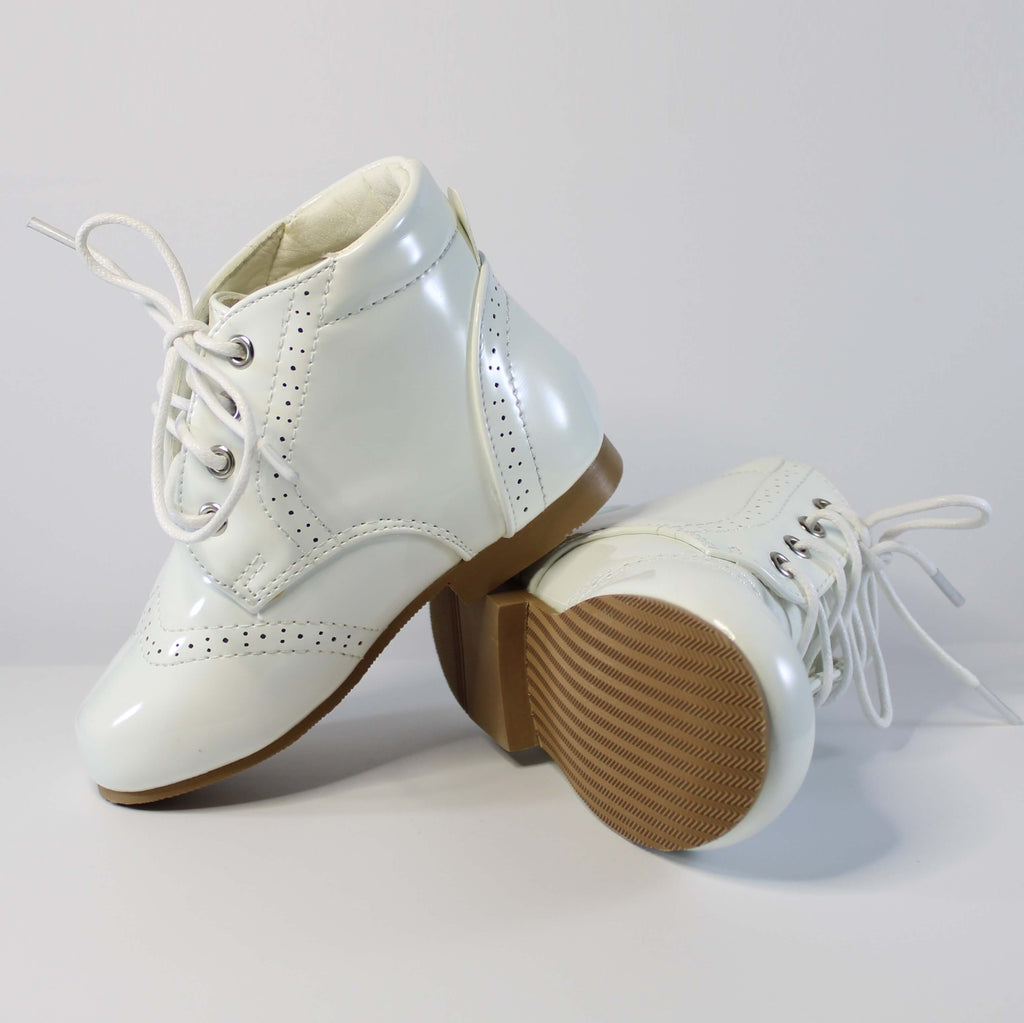 white sevva patent boots