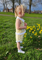 brand rep mia from tors childrens wear modelling heart scallop linen set from caramelo kids